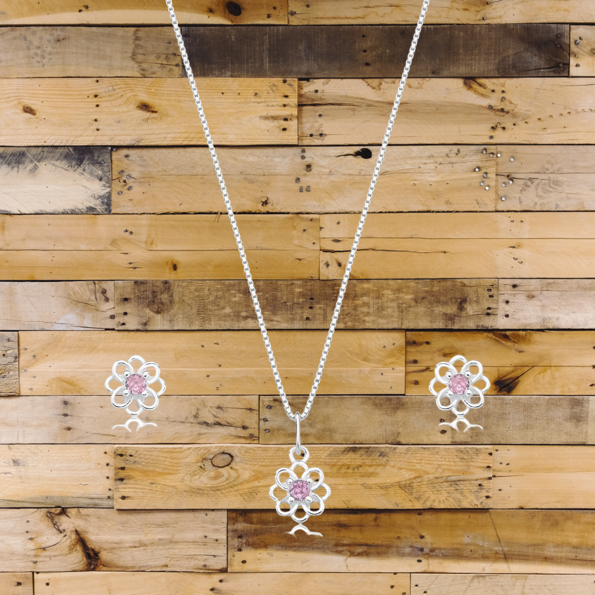 CONJUNTO FLOR COM PEDRA NO MEIO