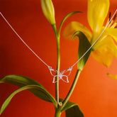 GARGANTILHA COM PINGENTE BORBOLETA